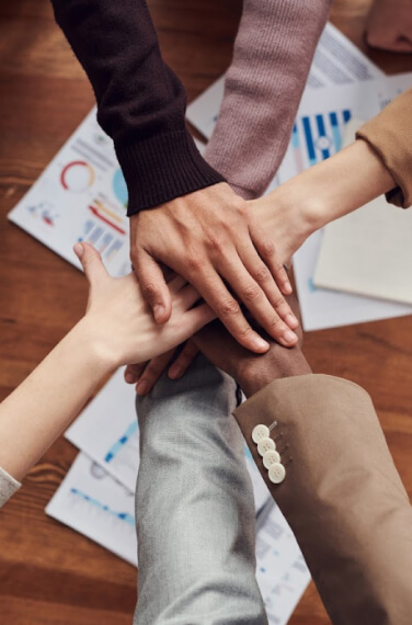 low view confident woman holding camera