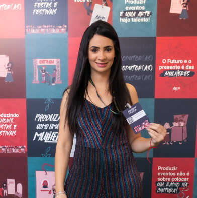 low view confident woman holding camera