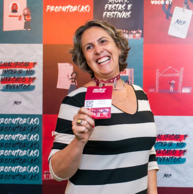 low view confident woman holding camera